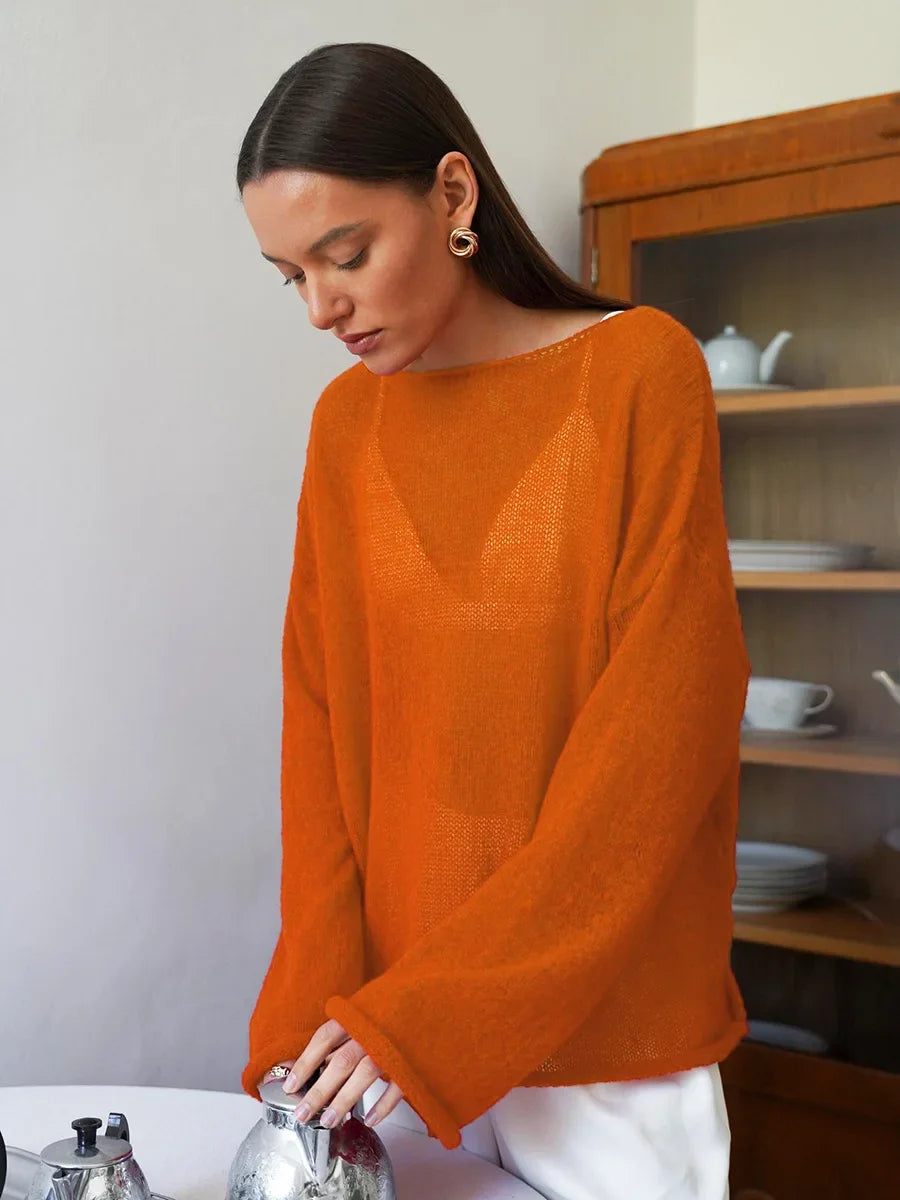 Pullover fashion a maglia traforata, scollo a barca,  vestibilità ampia, ampia gamma di colori, ideale per le sere di Primavera